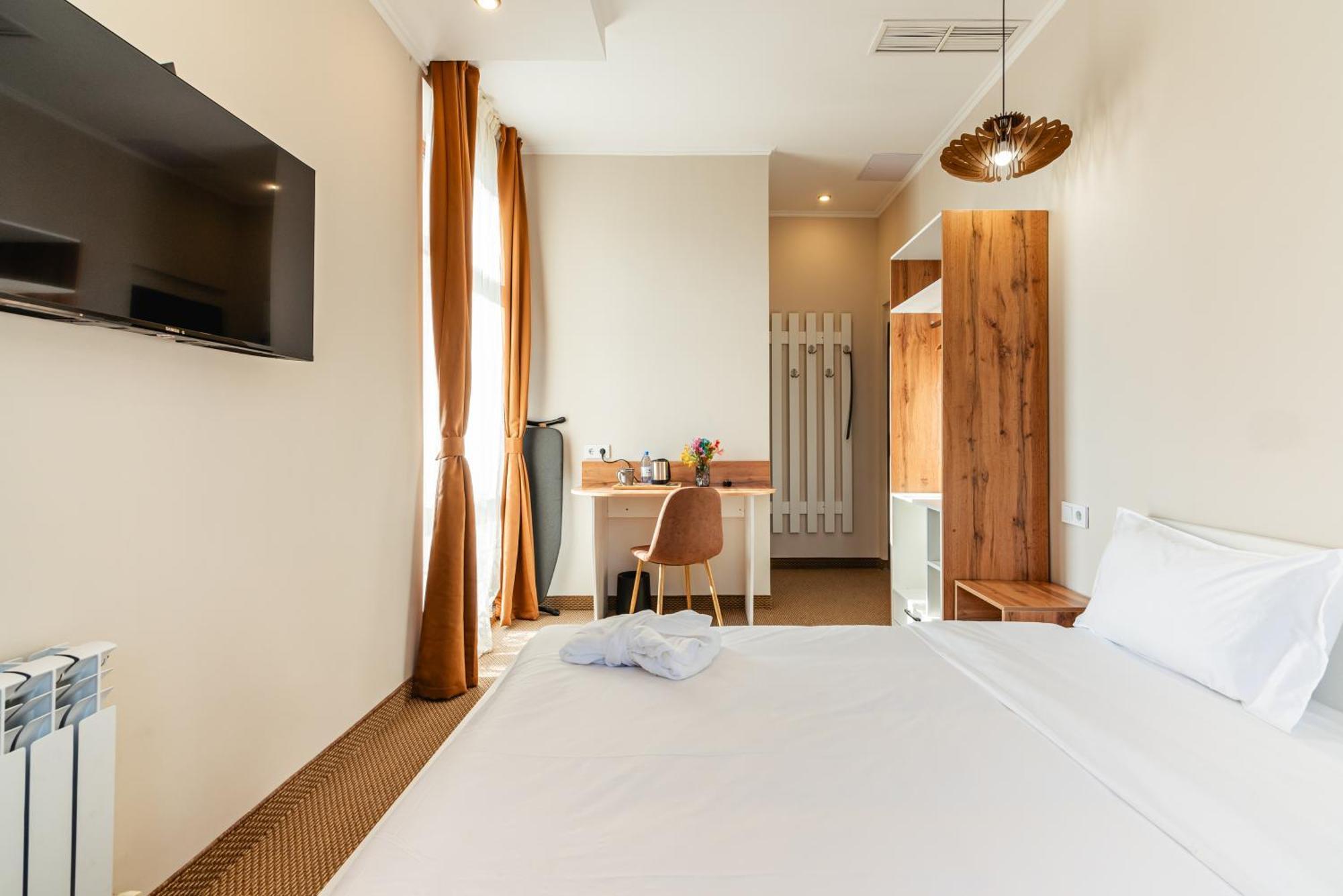 Aykun Hotel Alma-Ata Buitenkant foto
