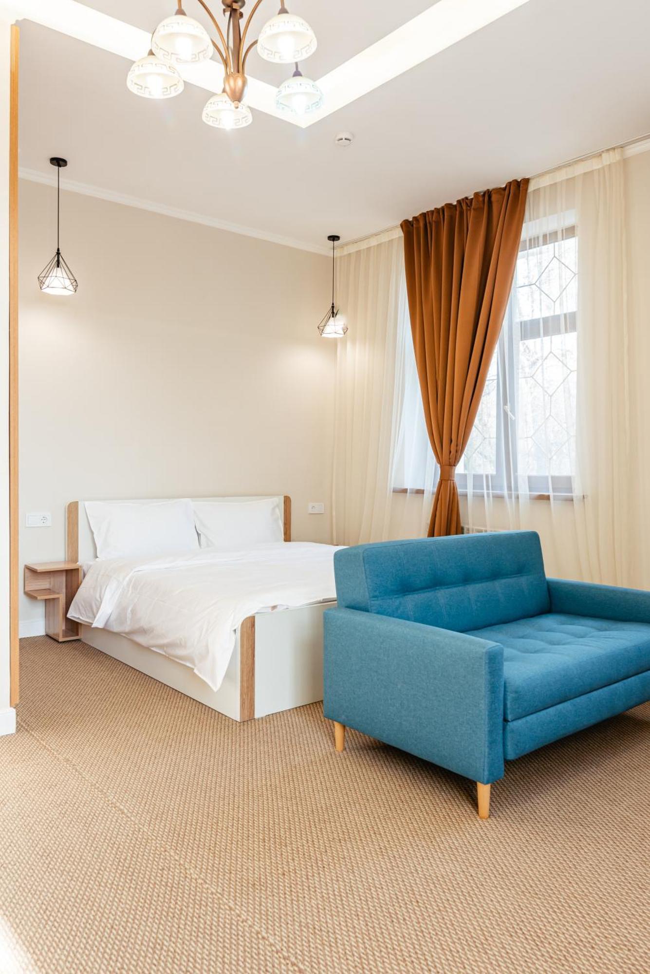 Aykun Hotel Alma-Ata Buitenkant foto