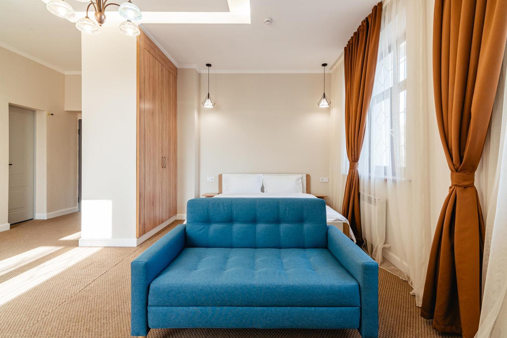 Aykun Hotel Alma-Ata Buitenkant foto